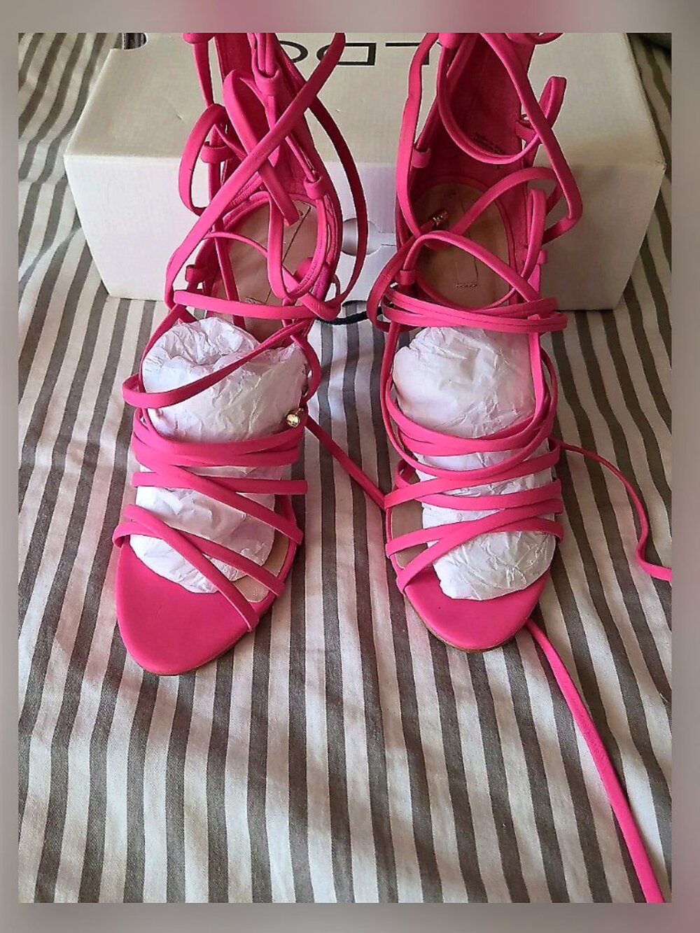 ALDO pink lace up heels.